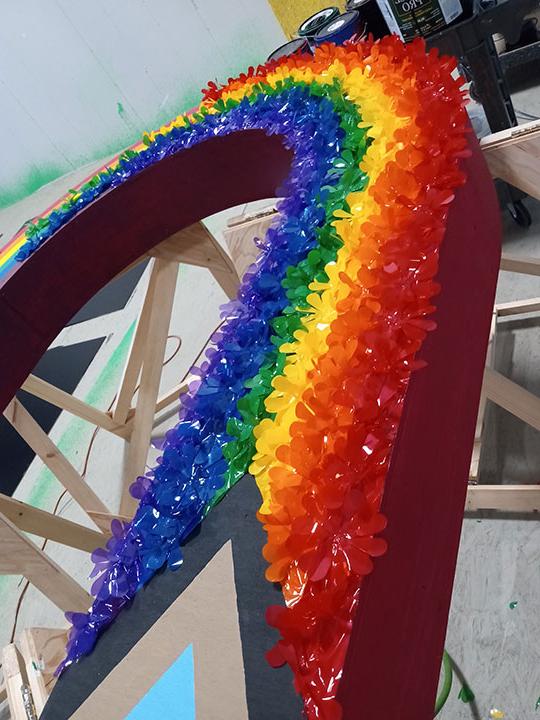 rainbow made from plastic flowers